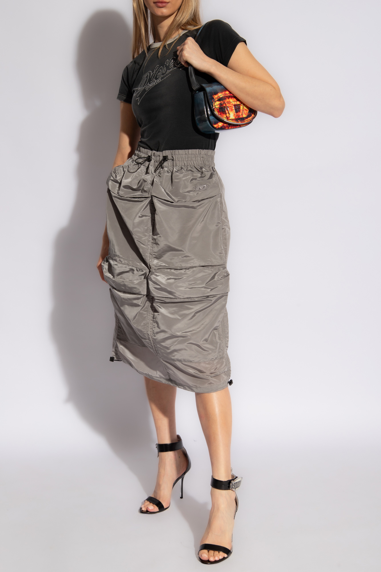 Diesel utility outlet skirt